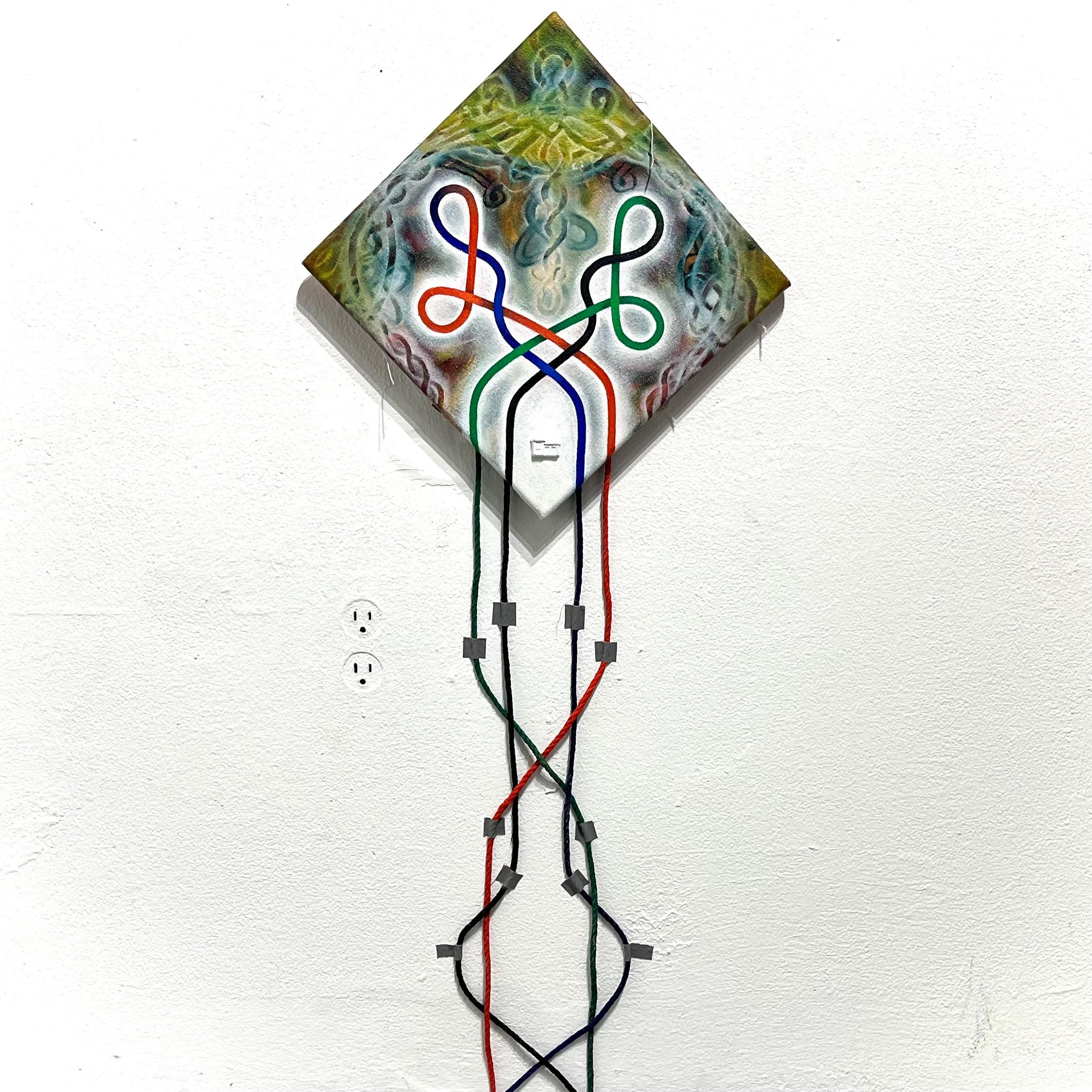 Kite sculpture with cords